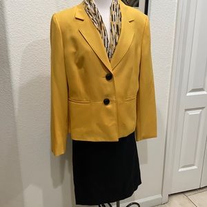 Take charge in this two piece business suit with scarf.